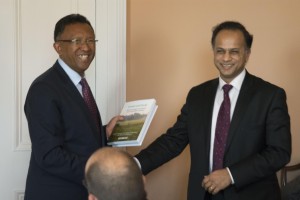 The President of Madagascar, Hery Rajaonarimampianina, receives a copy of Forests and Food from Bhaskar Vira (courtesy Cambridge Conservation Initiative)
